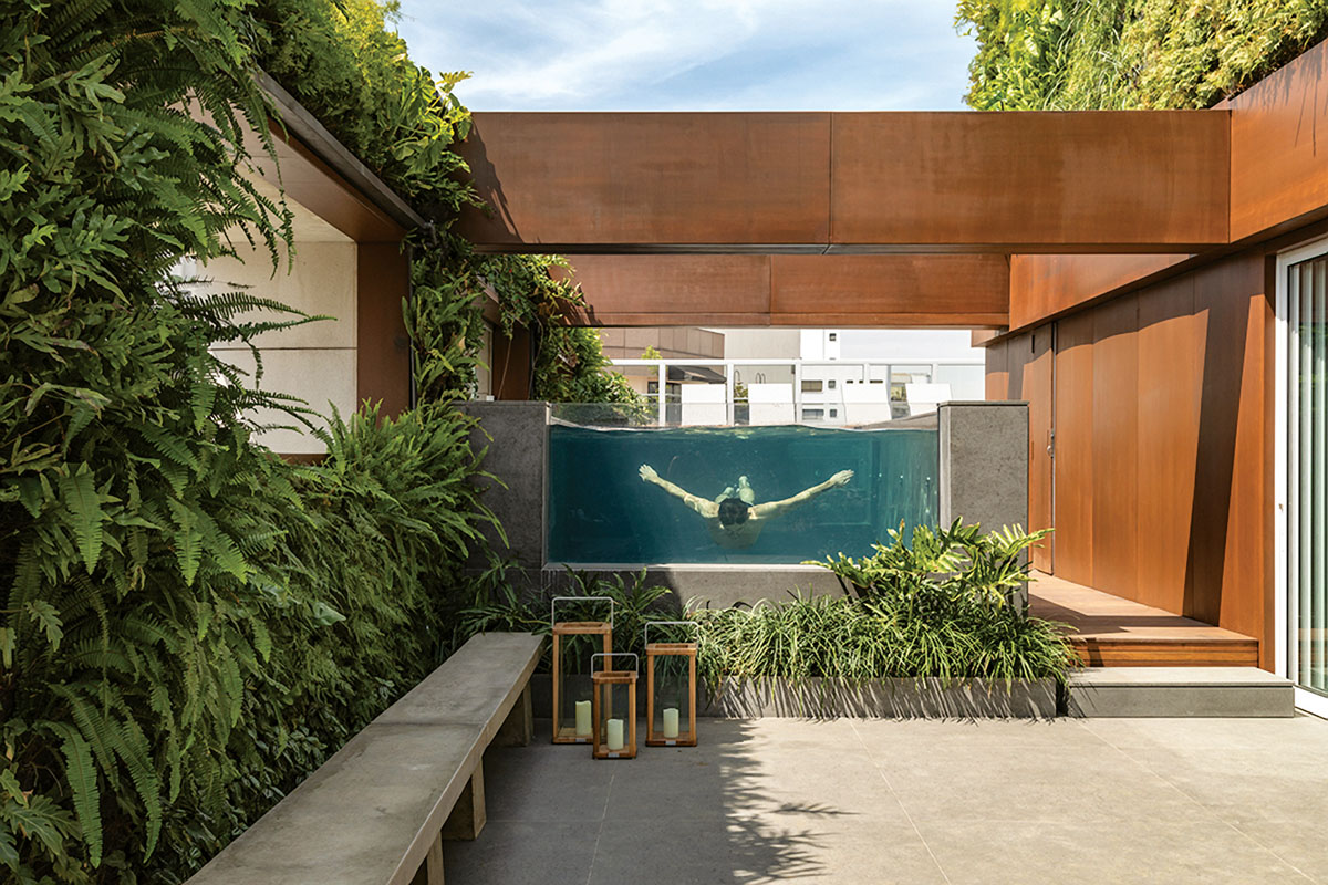 The installation materials themselves are two inches thick and can be added to almost any wall space—like this privacy courtyard.