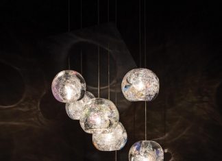 The Natural Inspirations round pendants are made of crystal infused with dichroic glass. Photo courtesy Fine Art Handcrafted Lighting