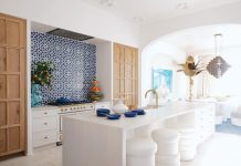 “We wanted the kitchen to remind us of a Mediterranean vacation—breezy, soulful, and full of life,” says Turner. “We designed the custom plastered light caps for the ceiling lights to bring in that artisanal feel, used blue and white zellige tile as backsplash for a hit of texture and color, and brought in beautifully crafted custom cabinetry from Karpaty Cabinets to tie it all together.”