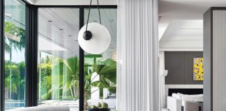 “The elliptical, boomerang-shaped banquet across from the kitchen is one of my favorite pieces in the space,” says Charette. “It’s petite but beautiful.”