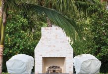Alfresco Textures Abound The purposely distressed surface of the custom outdoor fireplace in this backyard vignette from Kemble Interiors is ideal for the backdrop of lush greenery that surrounds it