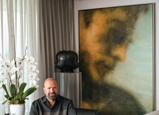 Advertising executive Manny Machado at his home in front of a Brett Murray bronze and Karlos Pérez’s Ametropia XIV (Diptych 1), 2013, oil on canvas. “I fell I love with this painting when I realized that when you look at it with the naked eye it looks blurry, but if you look at it through a camera lens it’s focused,” says Machado. “It’s a trick of the eye but quite a conversation starter.”