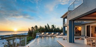 Architecture by RG Designs, design by Adelyn Charles Interiors, and landscaping by Outside Productions