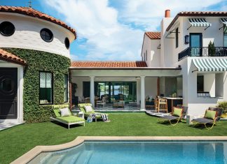 Poised on the southern tip of Manalapan, this Spanish Mediterranean-style dwelling features water views on two sides. Outfitted with RH loungers, the interior courtyard comprises a pool, a covered lanai, and multiple access points into the home.