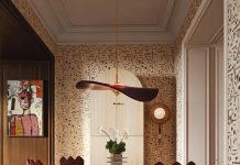 Solid maple Louis side chairs surround the Charlie dining table, all from the Helen Bergin Interiors for Abner Henry Collection