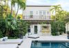 The home’s guest house was once a two-level garage that now serves as an art studio, a pool cabana, and guest accommodations.