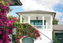 North Palm Beach Retreat is a Gem of Bermudian Design Designed by New York architect David Neff, the Bermudian-style house features an unexpected layout and U-shaped footprint, creating a surprisingly deep backyard. Draped in blossoming bougainvillea, the pool area features Neff’s clever arched built-in seating niche against geometric green tiles from Ceramic Matrix.
