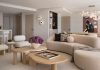 Miami Beach Pied-à-Terre Floats Above Biscayne Bay The design approach in the living room was to create a contemporary yet inviting space layered with softness and a touch of romanticism. The curved forms were intentional to soften the architecture and introduce a sense of fluidity and elegance. “The artwork by Eduardo Rezende immediately resonated with us,” says designer Jessica Jaegger, who helped the homeowners curate the collection in the residence. “It has a quiet, melancholic quality that brings a sense of introspection and calm and enriches the overall ambiance.”